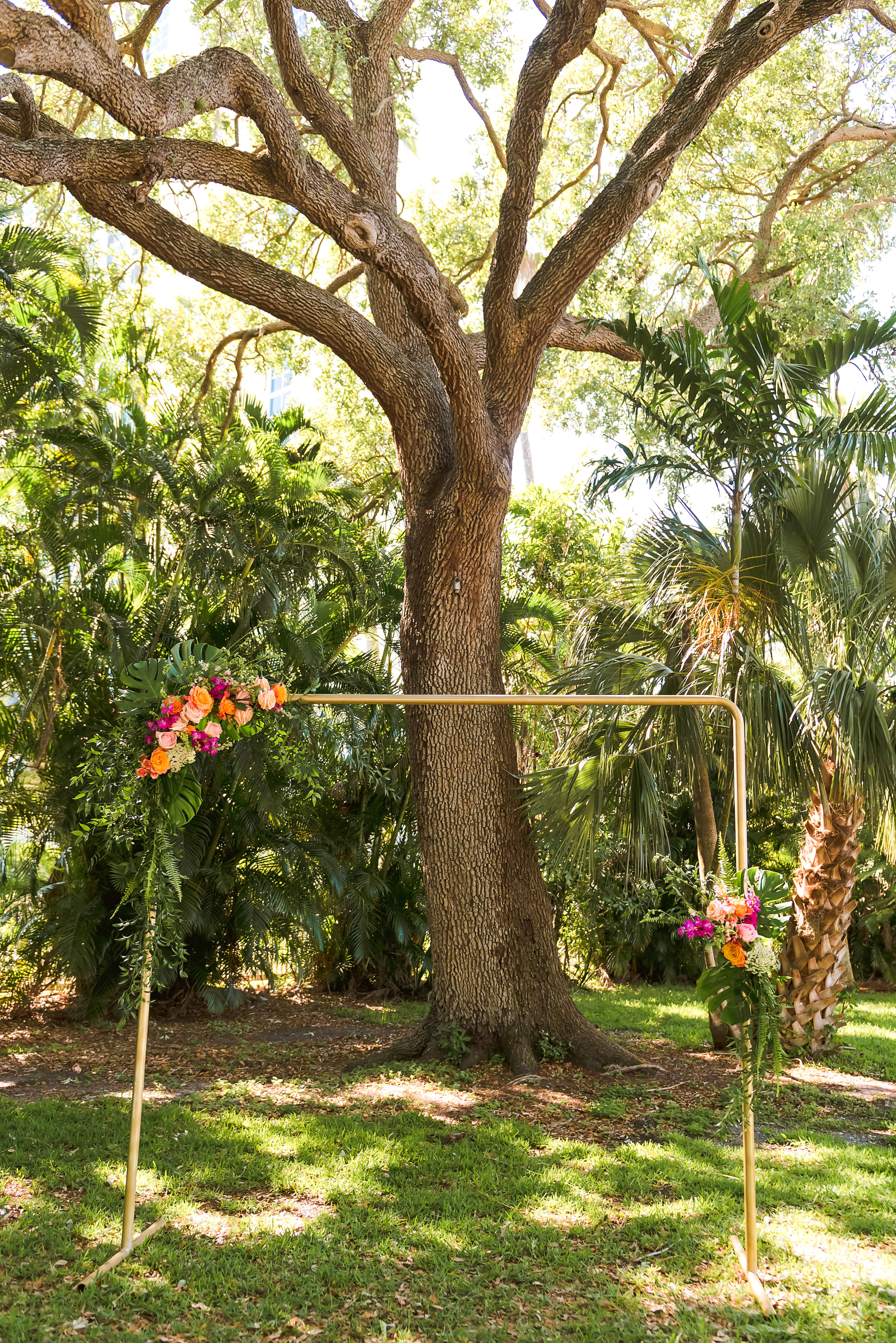 gold metal wedding arch | erin schmidt photo | burroughs home wedding fort myers florida wedding photos
